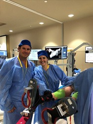 Robotic Technology Conference - Dr. Gerhardt and Tanya Cariveau posing with Mako Robot!